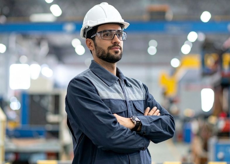 Manufacturing engineer working on industrial floor
